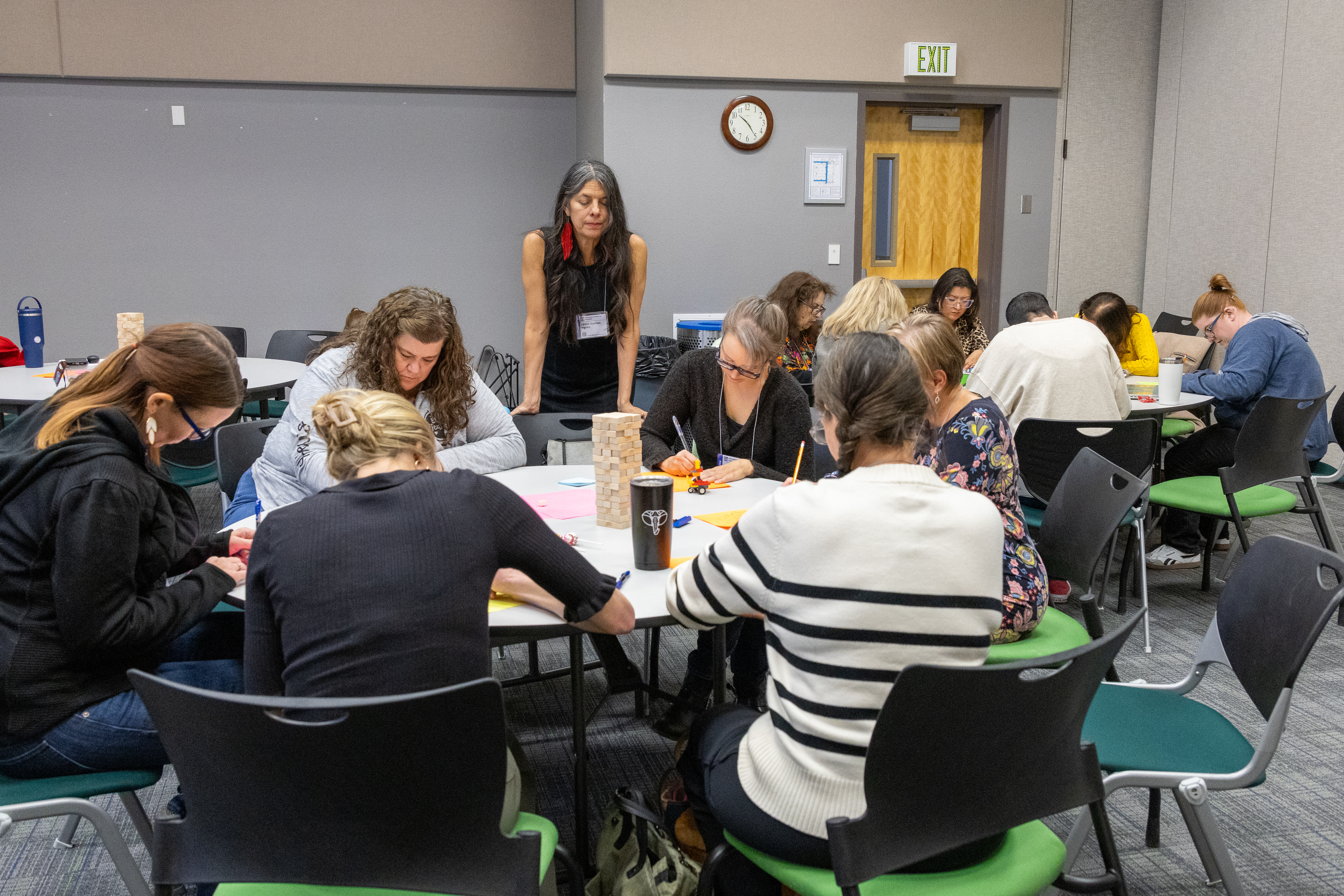 Multilingual educators working on convention workshop