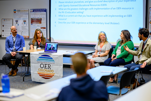 Teachers talk at OERColorado conference. 