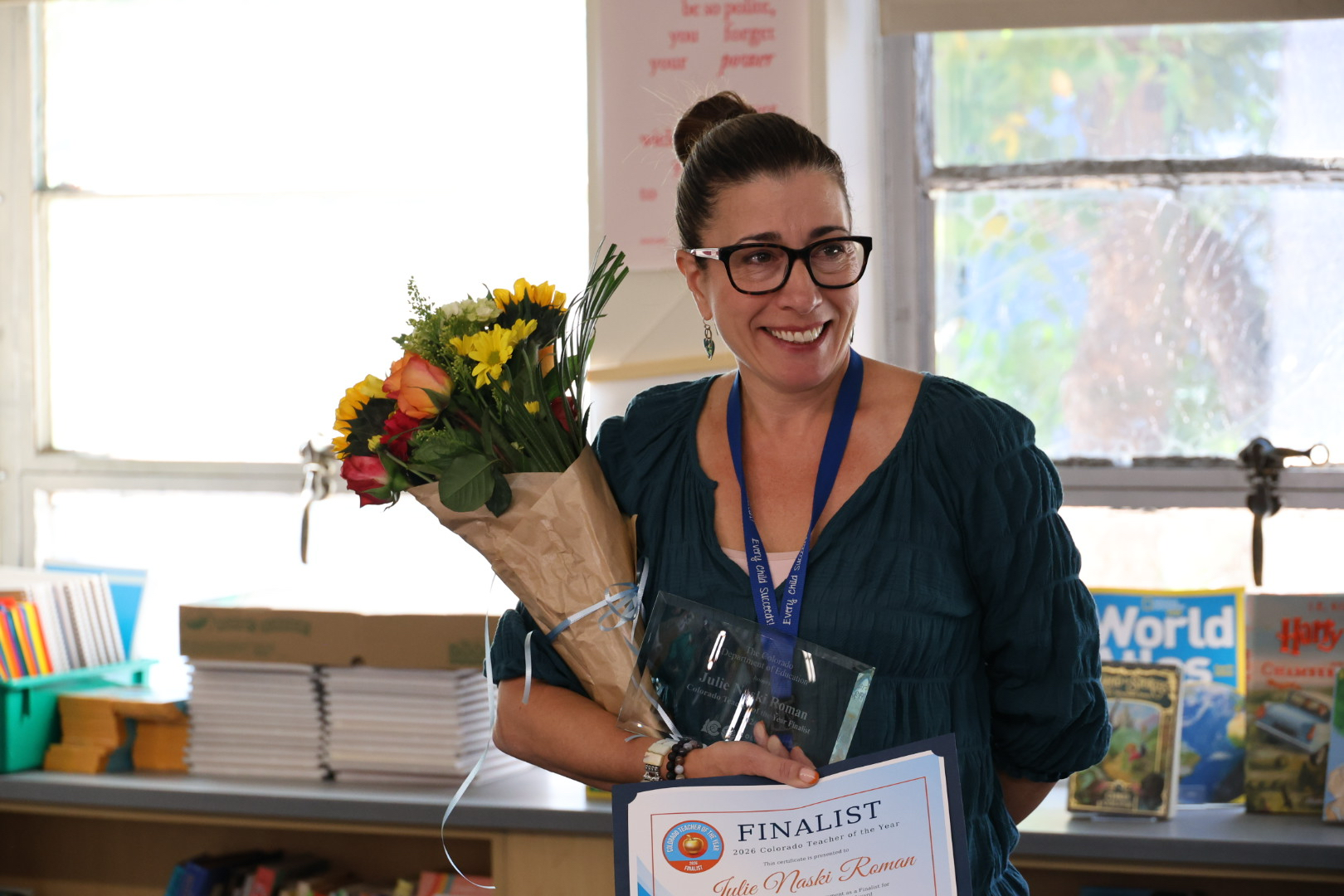 Julie Naski Roman, a finalist for the 2026 Colorado Teacher of the Year award, gets surprised in her classroom on Sept. 2, 2025. 